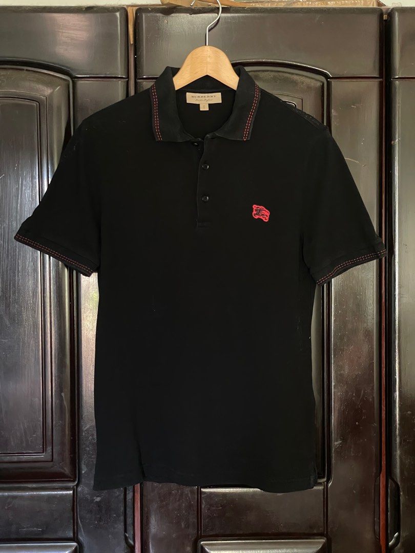 Burberry Black Polo Shirt (Category: Tshirts & Polo Shirts ) located in Dasmarinas. Submitted by matt.declutter (Listing ID 1305915776, Image 2). Description: Burberry Black Polo shirt dimension: 18 x 28 size on tag: Medium.