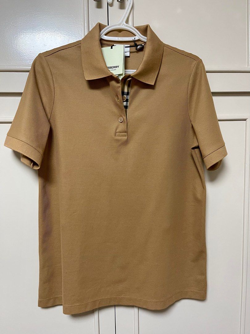 Burberry Polo Shirt (Category: Shirts) located in Paranaque City. Submitted by robear26 (Listing ID 1305903814, Image 1). Description: Size is Large armpit to armpit - 19.5 inches Length - 27 inches Selling low, SRP is 410 USD.
