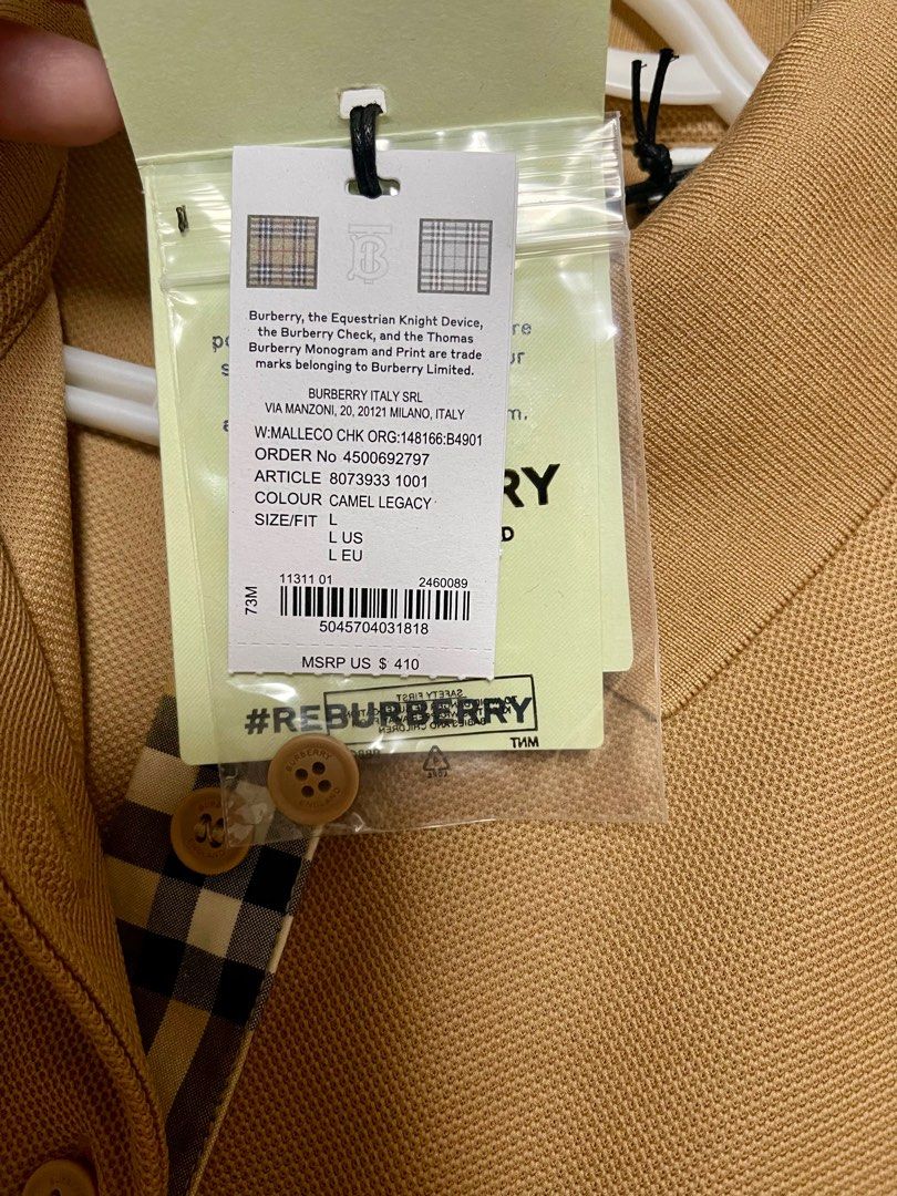 Burberry Polo Shirt (Category: Shirts) located in Paranaque City. Submitted by robear26 (Listing ID 1305903814, Image 2). Description: Size is Large armpit to armpit - 19.5 inches Length - 27 inches Selling low, SRP is 410 USD.