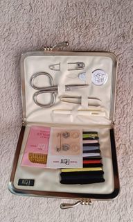 Complete travel sewing kit in kisslock tapestry purse