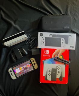 Nintendo Switch Oled (negotiable) with Games and Freebies