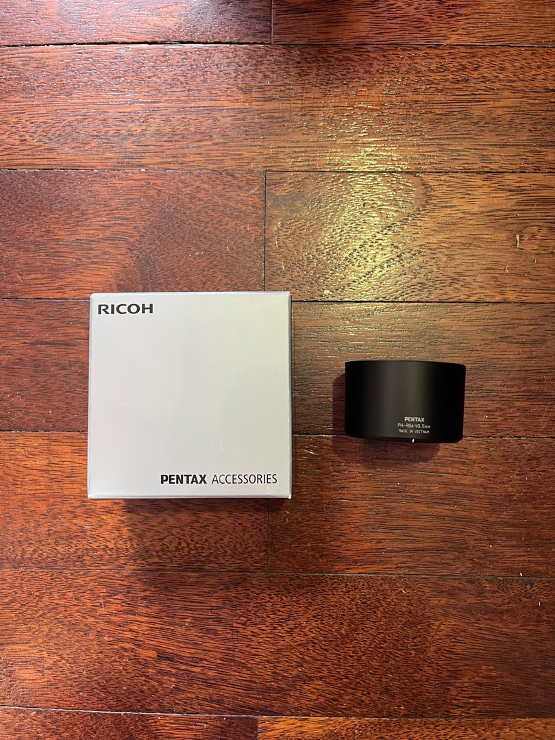 Pentax Q 06 Telephoto Zoom Lens Hood PHRBA40.5, Photography, Lens & Kits on Carousell