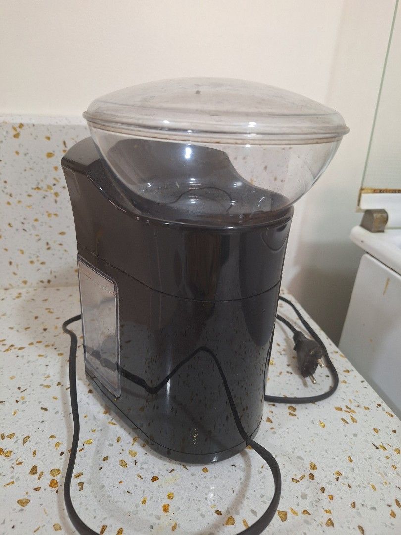 Severin KM 3874 coffee grinder (Category: Juicers, Blenders & Grinders) located in Imus. Submitted by mymy.redondo (Listing ID 1305918237, Image 3). Description: Used but well loved Severin KM 3874. Needs cleaning. I've only used this to grind for french press and pour over. Not sure how well it works for finer grinds. It's a decent entry level grinder in my opinion. Good also if you need to grind a lot of beans at one time. RFS: will use a manua