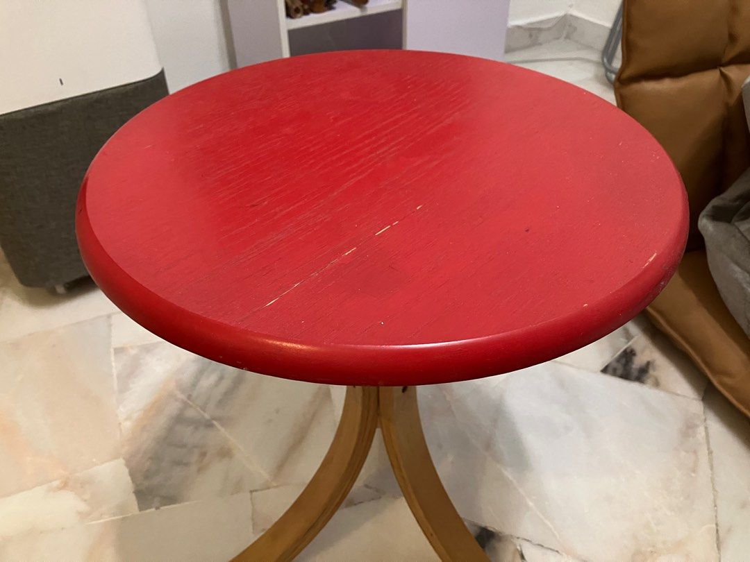 Red solid wood table (Category: Tables & Sets) located in Subang Jaya. Submitted by cctrades (Listing ID 1305945651, Image 3). Description: Cute retro red mini coffee table or side table. Solid wood table, just has a big of paint chipped at top which adds to the accent of the wood. Used only to place items on top. In very good condition.