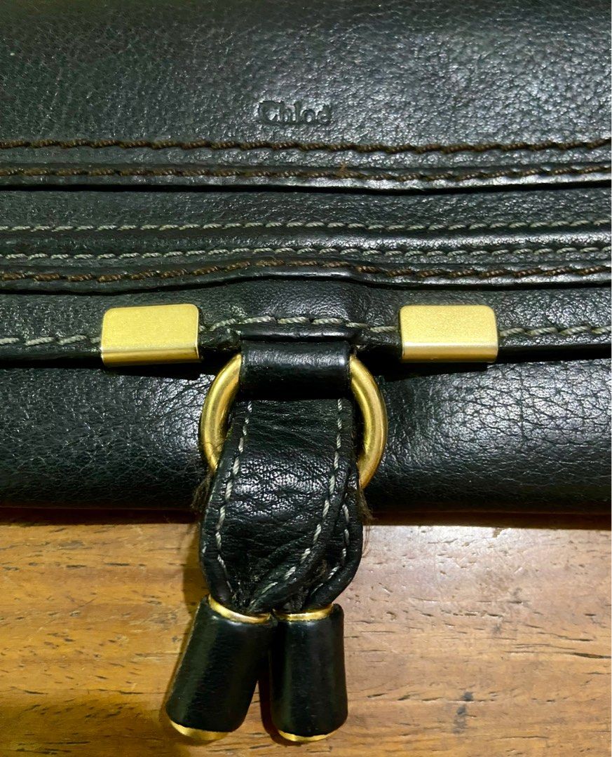 Chloe Marcie Long Flap Wallet (Category: Luxury Bags & Wallets) located in Manila. Submitted by rosamanerds (Listing ID 1301348471, Image 2). Description: Authentic preloved Chloe Marcie long flap wallet color black. Grained leather with gold hardware. In very good condition.With holo sticker. Made in Spain. .