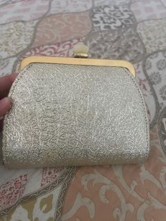 Gold clutch bag with sling