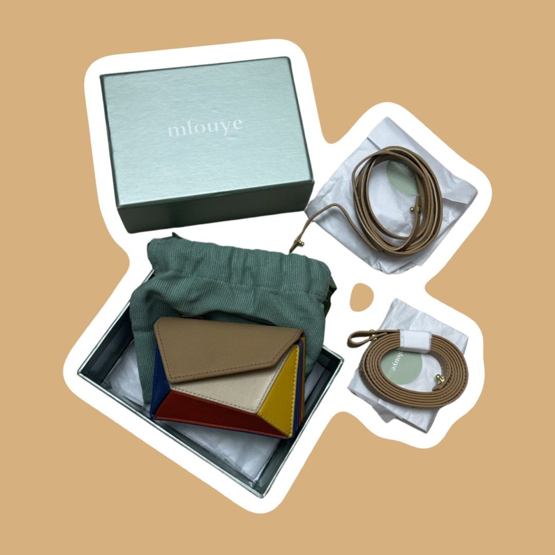 Mlouye Naomi Mini Wallet (Comes with Extra Strap) (Category: Luxury Bags & Wallets) located in Taguig. Submitted by retailtherapyph (Listing ID 1285476564, Image 2). Description: • Comes with extra strap • Can be worn two ways • Last price already posted, selling low already.