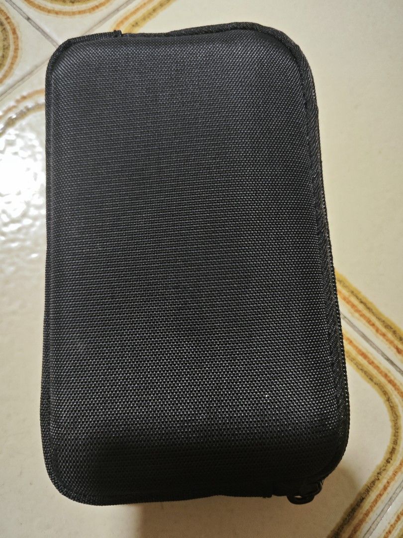 Multi purpose pouch (Category: Purses & Pouches) located in Singapore. Submitted by rollinyl (Listing ID 1301436711, Image 2). Description: brand new can store phone. power bank self collect 390042.