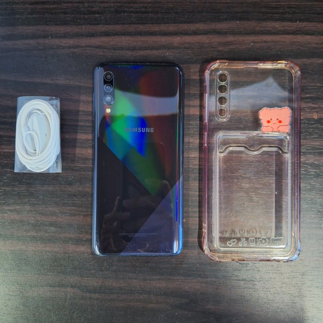 Samsung Galaxy A30s (Category: Samsung) located in Imus. Submitted by rhsamonte (Listing ID 1301334868, Image 2). Description: Samsung Galaxy A30s • Selling for 3000php • No issues • Battery still lasts a full day • Lady-owned, first hand • Cracks on tempered glass only • Will include phone case and adapter • RFS: upgraded to a new phone.