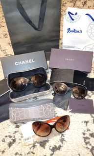Take all sunglasses: Channel, Prada and Calvin Klein