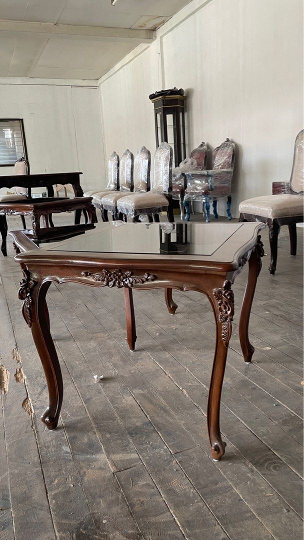 Vintage narra side tables (glass top) (Category: Tables & Sets) located in Quezon City. Submitted by kaylas__ (Listing ID 1301352257, Image 3). Description: Vintage Narra Side Tables (per piece, with discount if 2 pieces) - Newly refurbished, no issues - Made of Narra - Table top is in 6MM tinted tempered glass - Pick up at Marikina PM for offers, thank you!.