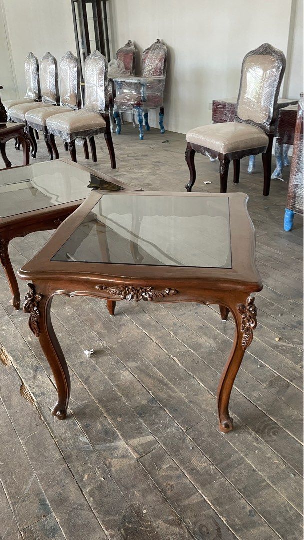 Vintage narra side tables (glass top) (Category: Tables & Sets) located in Quezon City. Submitted by kaylas__ (Listing ID 1301352257, Image 1). Description: Vintage Narra Side Tables (per piece, with discount if 2 pieces) - Newly refurbished, no issues - Made of Narra - Table top is in 6MM tinted tempered glass - Pick up at Marikina PM for offers, thank you!.