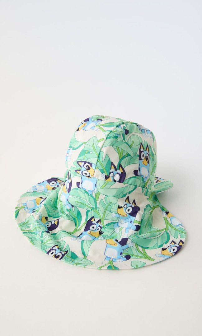 ZARA Kids Bluey Swimming Hat/Cap (Category: Caps & Hats) located in Quezon City. Submitted by prebyic (Listing ID 1301415062, Image 3). Description: Brand New w/ Tags Blue | 0962/542 1-3 yrs Swimming Hat Front Visor and Back Flap to protect the nape Bluey Ludo Studio Print Sooooo cute 😍.