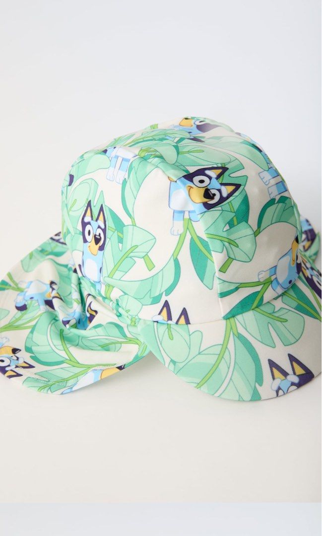 ZARA Kids Bluey Swimming Hat/Cap (Category: Caps & Hats) located in Quezon City. Submitted by prebyic (Listing ID 1301415062, Image 2). Description: Brand New w/ Tags Blue | 0962/542 1-3 yrs Swimming Hat Front Visor and Back Flap to protect the nape Bluey Ludo Studio Print Sooooo cute 😍.