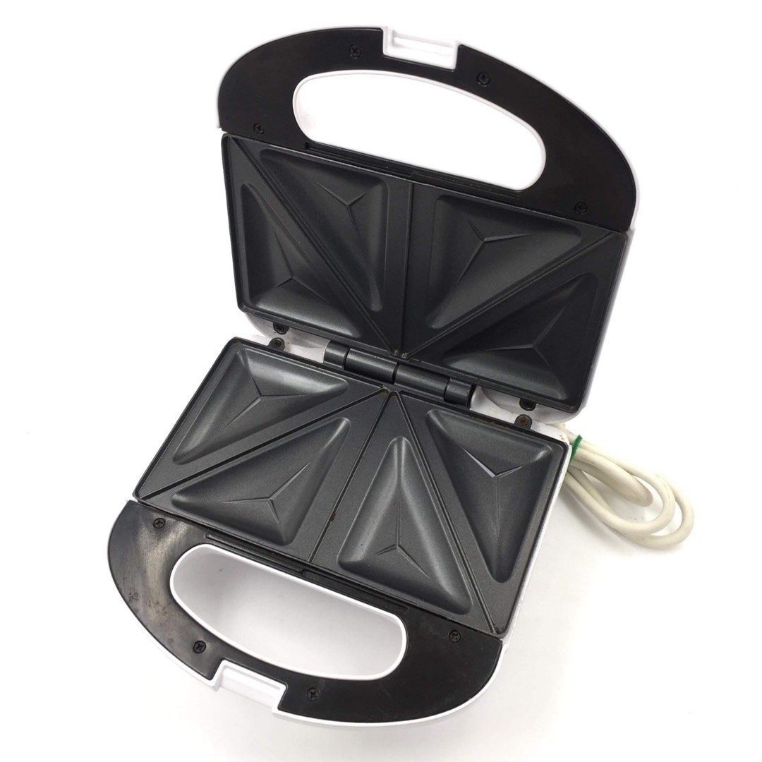 ANKO 2 Slice Sandwich Maker Bread Toaster (Category: Breadmakers) located in Pasay City. Submitted by enrico_appliances (Listing ID 1306079877, Image 1). Description: -Power Rating: 220-240V ~ 50-60Hz / 750 Watts -Unit Model: FS-8016-T -Features: Power on and ready lights; 2 slice Non-stick cooking plates -Stands upright for easy storage w/ Skid resistant feet -Thermostat control with red and green pilot light -Enjoy yummy sandwiches with this 2 