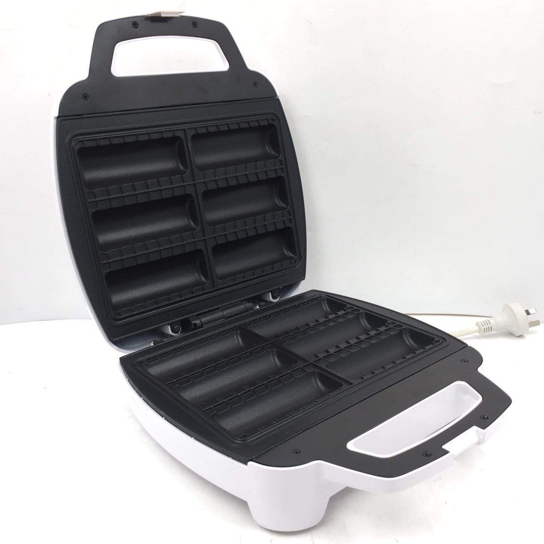 ANKO Sausage Roll Maker - White (Category: Breadmakers) located in Pasay City. Submitted by enrico_appliances (Listing ID 1306080671, Image 3). Description: Description: -Power Rating: 220-240V ~ 50-60Hz / 1300-1500 Watts -Unit Model: FS-2898A-SR -Dimensions/Size: 28.8 cm (H) x 32.7 cm (W) x 10.1 cm (D) -Makes 6 sausage rolls in Non-stick cooking plates -Stands upright for easy storage with cool-touch handle -Overheat protection + Indication lamp