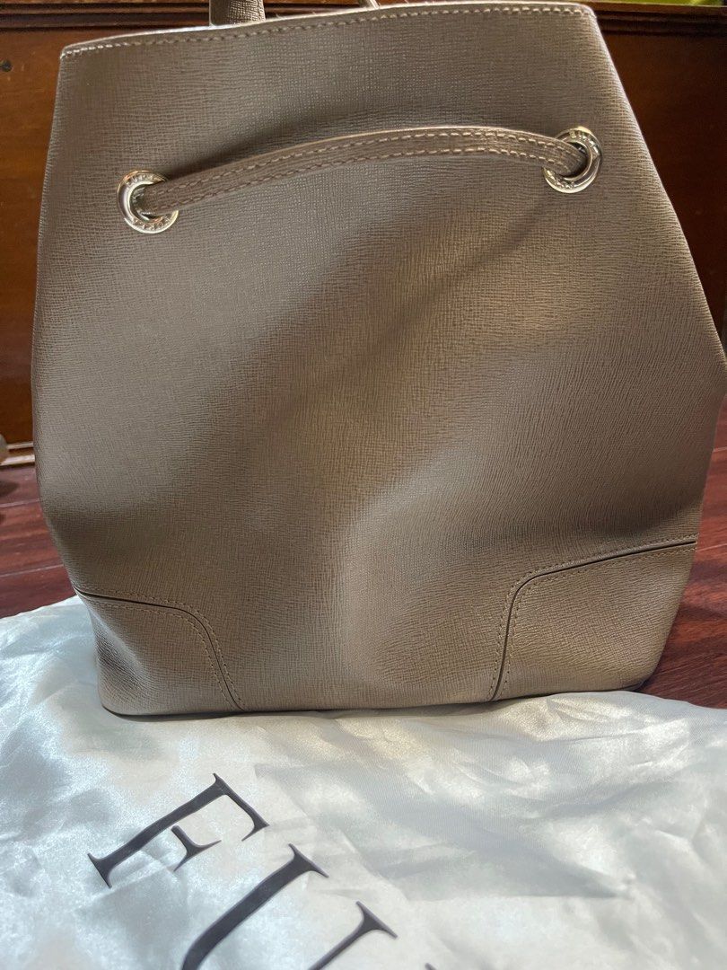 Furla Bucket Bag (non nego) (Category: Luxury Bags & Wallets) located in Paranaque City. Submitted by thriftcs (Listing ID 1306125807, Image 2). Description: with dust bag.