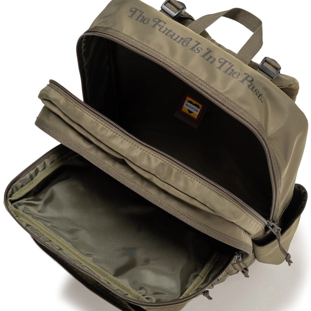 HUMAN MADE BACKPACK (Category: Backpacks) located in Singapore. Submitted by nichloesg (Listing ID 1306167249, Image 3). Description: ✅ Olivedrab H44 x W30.5 x D16cm But Human Made Prototype backpack with the Verdy-designed brand logo. The structured, dual-layered pockets have a large capacity, making the bag a functional choice for both work and play. MATERIAL: 100% NYLON Find us at @nichloesg Tags Nigo.