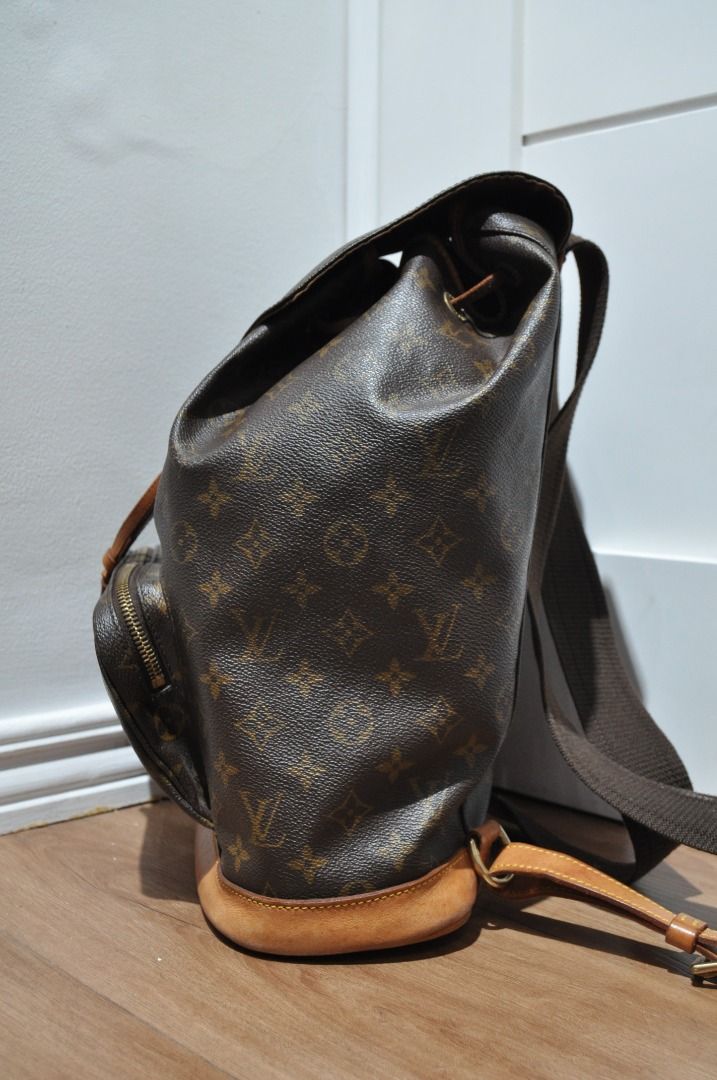 Louis Vuitton - 2001 - Monogram Montsouris (Category: Luxury Bags & Wallets) located in Manila. Submitted by graymatter_ (Listing ID 1306101240, Image 3). Description: Louis Vuitton - 2001 - Monogram Montsouris Tagged Size: GM Condition: Rank A Flaws: Aging of Vachetta Leather (Spots, Light Rubs, Darkening) Material: 100% Coated Canvas, 100% Leather Made in: France Dimensions Height: 14.5 Width: 12.25 Depth: 5.25.