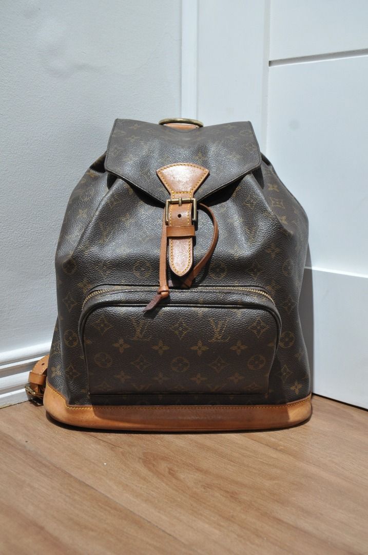 Louis Vuitton - 2001 - Monogram Montsouris (Category: Luxury Bags & Wallets) located in Manila. Submitted by graymatter_ (Listing ID 1306101240, Image 1). Description: Louis Vuitton - 2001 - Monogram Montsouris Tagged Size: GM Condition: Rank A Flaws: Aging of Vachetta Leather (Spots, Light Rubs, Darkening) Material: 100% Coated Canvas, 100% Leather Made in: France Dimensions Height: 14.5 Width: 12.25 Depth: 5.25.