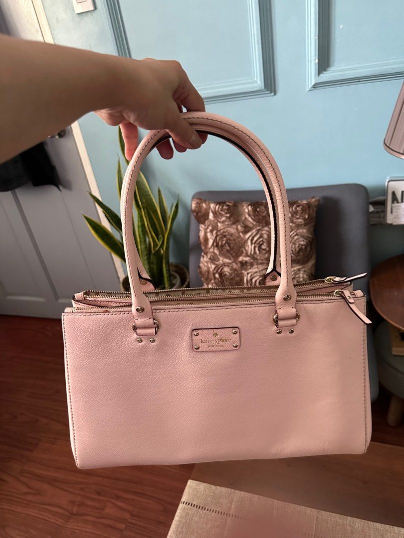 💯 % Original Kate Spade Leather Tote Bag (Category: Luxury Bags & Wallets) located in Quezon City. Submitted by fashion4less__ (Listing ID 1306230240, Image 2). Description: 💯 authentic in good condition with little stain inside (see photo #7) seldom used - na stock lang sa closet 🫰🏻 can be used as laptop bag color is baby pink, super cute yet spacious 🩷 super sale!!! .