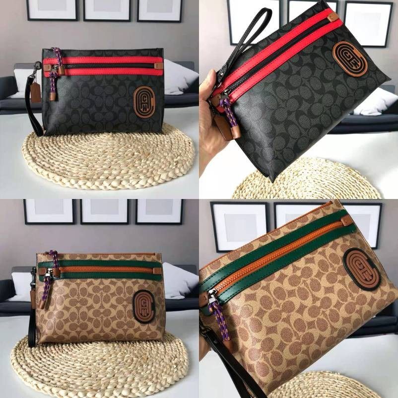 Coach Academy Pouch In Signature Canvas With Coach Patch Men Wristlet Clutch Men s Fashion Bags Belt bags Clutches and Pouches on Carousell