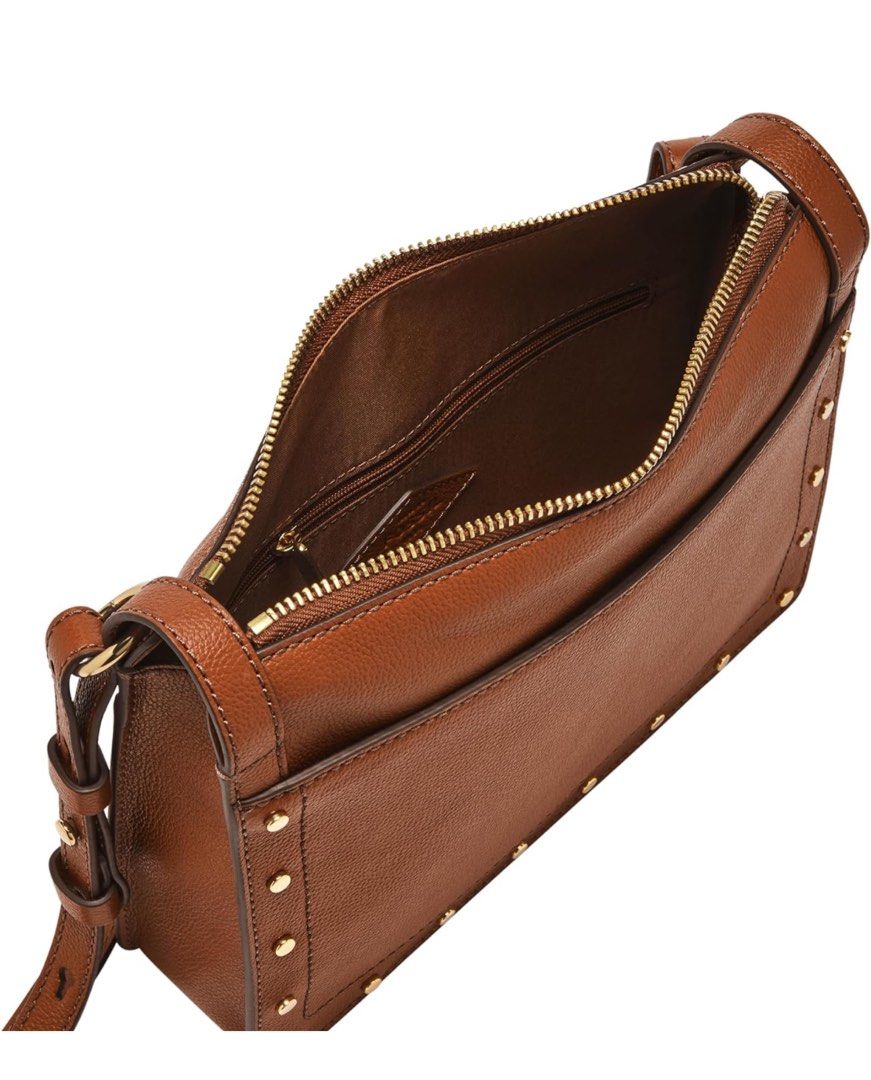 Fossil Taryn Leather Bag (Category: Cross-body Bags) located in Bacoor. Submitted by memaeee (Listing ID 1306291276, Image 3). Description: • Cow Leather • Zip top closure • Adjustable crossbody strap • Back Slide Pocket • Front Slide Pocket.