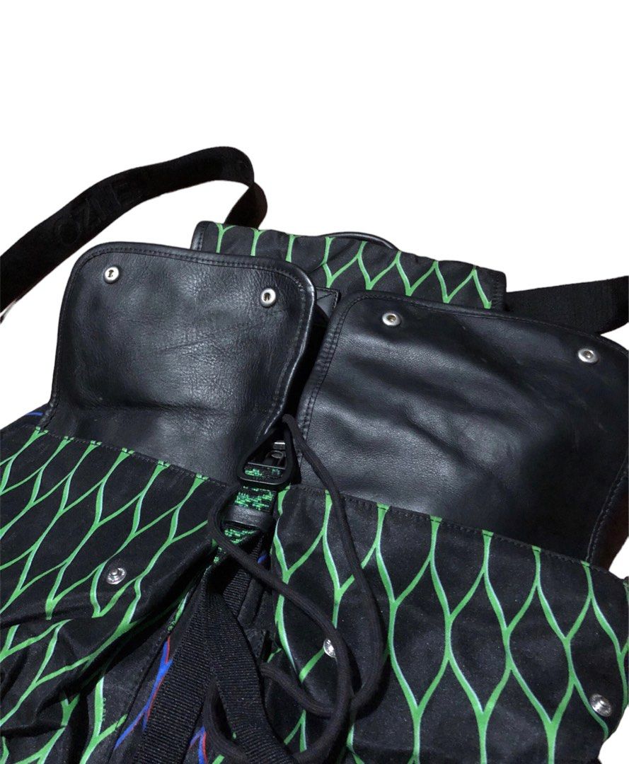 Kenzo x H&M Drawstring Multicolor Backpack (Category: Luxury Bags & Wallets) located in Dumaguete. Submitted by overthrifted (Listing ID 1306283457, Image 2). Description: Kenzo x H&M Drawstring Multi Color Backpack Large size 18width 16 height 7 length (measured ng nakatayo, ang length ay measured ng nasa ilalim) Authentic Retails at 10k plus Only issue is small chipped on the metal sa drawstring di naman makikita kasi nasa loob naman 2200 add s