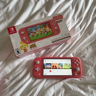 Nintendo Switch Lite Coral (Animal Crossing: Isabelle Aloha Edition) Complete with Box, Freebies, and 14 Digital Games