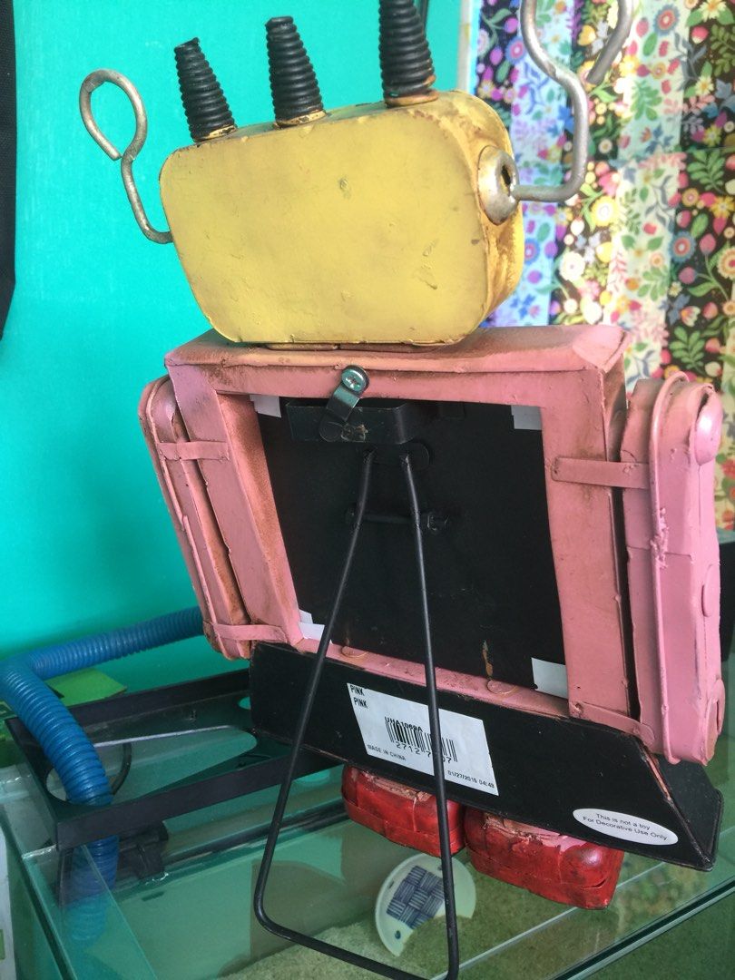 Photo Frame Set Vintage Look Robot Handcraft (Category: Frames & Pictures) located in Taguig. Submitted by mgreyz (Listing ID 1306253086, Image 3). Description: Used Photo Frame Metal Vintage Look Robot Rustic design -used with minor flaws due to storage - bought from Dimensioné - handmade and handpainted type MoP: Gcash / Seabank Shipping fee nit included. Thank you. .