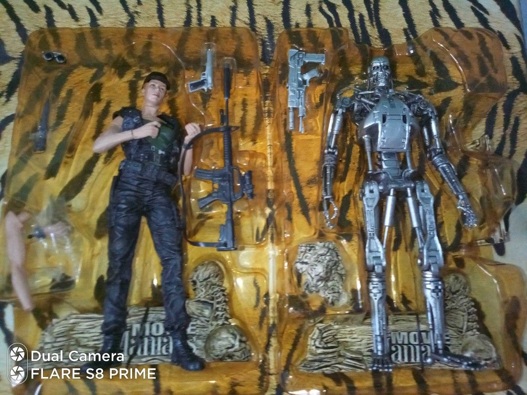 T2 Sarah and T800 set (Category: Figurines & Statues) located in Cavite. Submitted by richard.heart (Listing ID 1306236601, Image 2). Description: McFarlane Movie Maniacs Terminator 2 Judgment day, Sarah Connor and T800 Endoskeleton. Figures are BiB but are in good condition (Sarah's right wrist is stuck) and all accessories are complete. See images, WYSIWYG..
