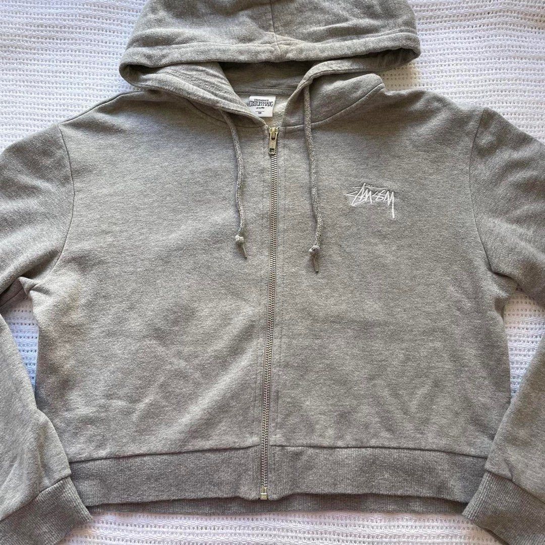 VINTAGE STUSSY ZIP UP HOODIE (Category: Women's Clothes) located in Sydney. Submitted by talia_02 (Listing ID 1306203052, Image 1). Description: Stussy International Tribe Hoodie - Grey Size 10 Zip up hoodie Slightly cropped In excellent condition!.