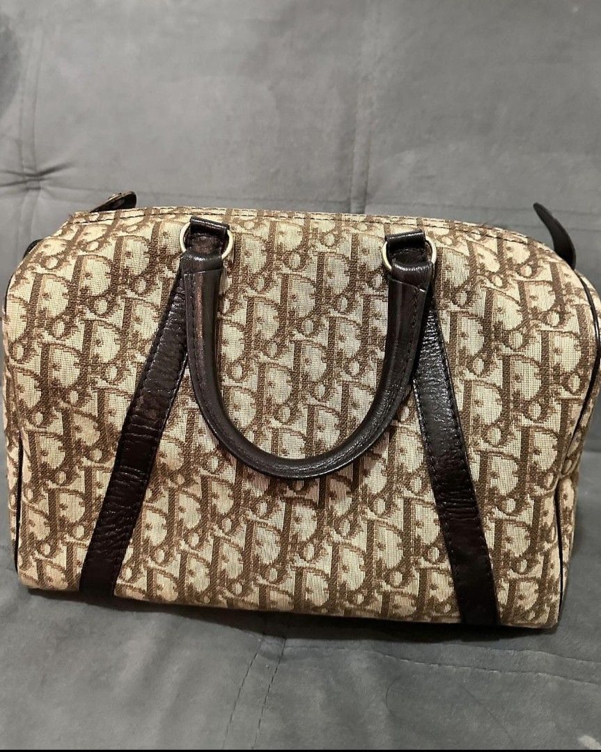 Authentic dior (Category: Luxury Bags & Wallets) located in Quezon City. Submitted by preetycindz (Listing ID 1301650837, Image 1). Description: 100% authentic dioe brown monogram trotter boston bag rank 8/10 condition money back if proven fake.