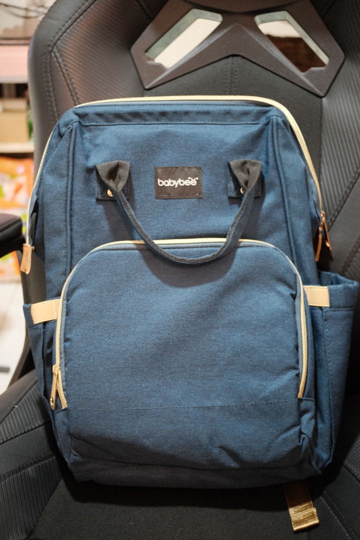 Babybee Nappy Bag in Navy Blue (Category: Backpacks) located in Naga. Submitted by docalen (Listing ID 1301501793, Image 1). Description: Used once as we bought a bigger diaper bag. Just sat in the closet. No issues. Can pass as brand new. .