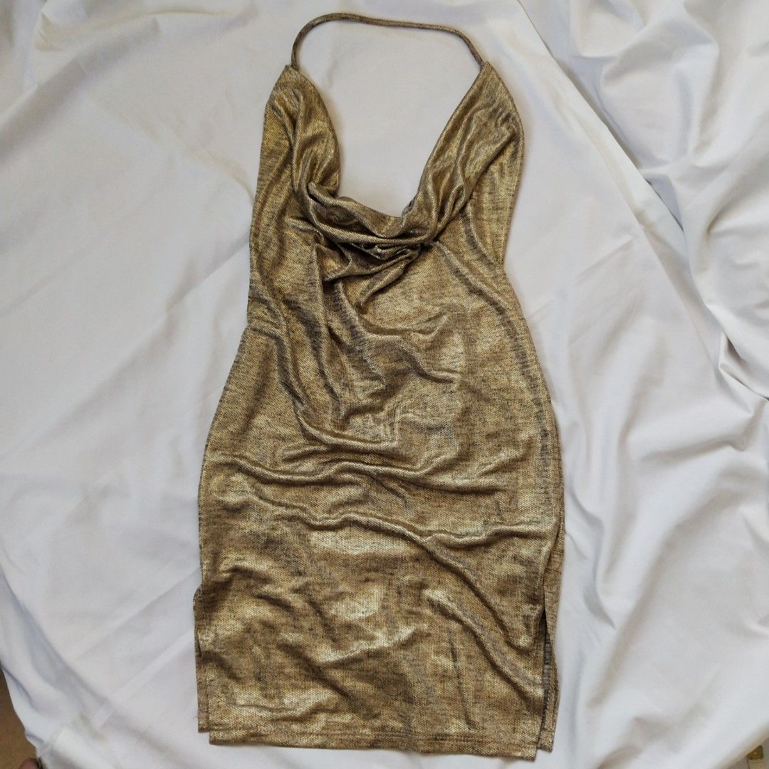 Backless cowlneck metallic party dress (Category: Dresses) located in Makati City. Submitted by denise.syy (Listing ID 1301632613, Image 1). Description: has a really high slit on both sides thats why i had it stitched para the slit wont be revealing masyado. only worn once for a photoshoot :).