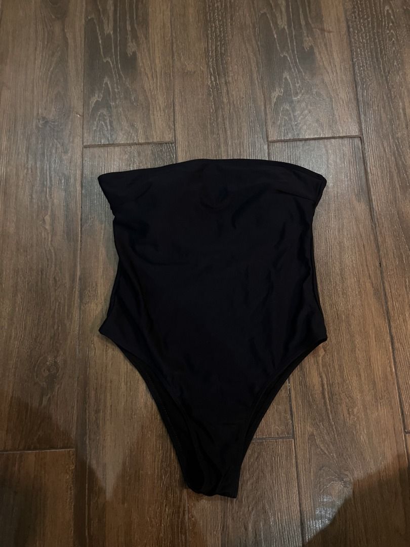 Black Tube - One Piece (Category: Bikinis & Swimsuits) located in Manila. Submitted by adventt (Listing ID 1301632932, Image 1). Description: Never used Size small My measurements for reference: 34 - 26 - 35 Padded .