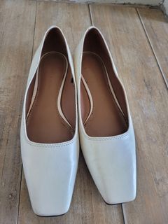 Charles and Keith white flats