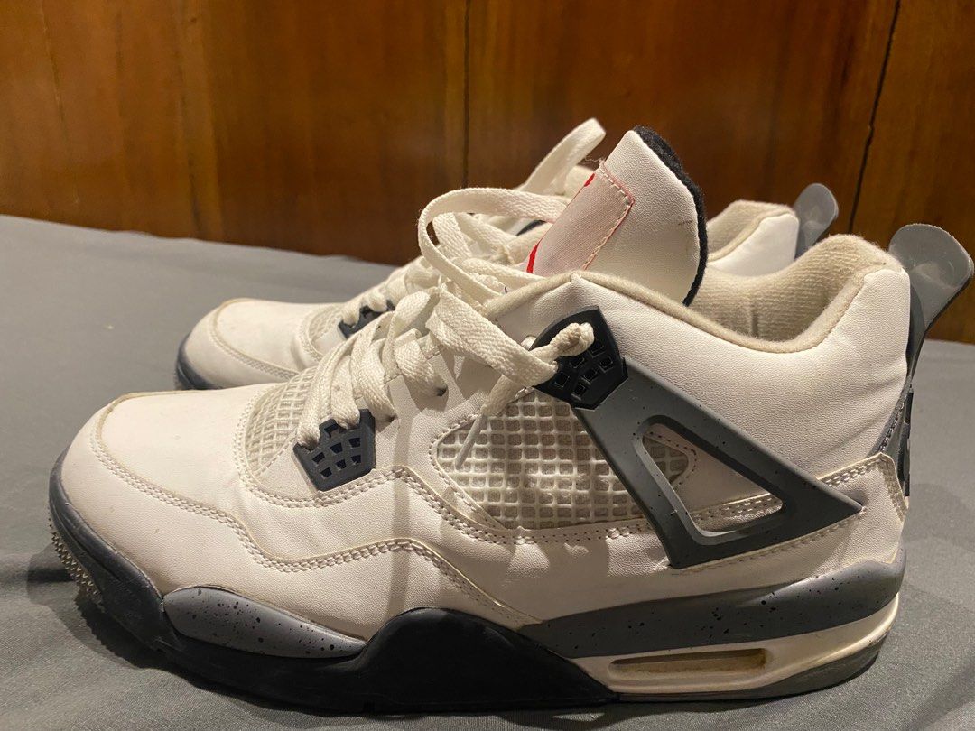 Jordan 4 white cement (Category: Sneakers) located in Quezon City. Submitted by channyboi05 (Listing ID 1301641425, Image 3). Description: Jordan 4 white cement size 11 US UA pair - Negotiable - Used twice - UA - Meetups/delivery .