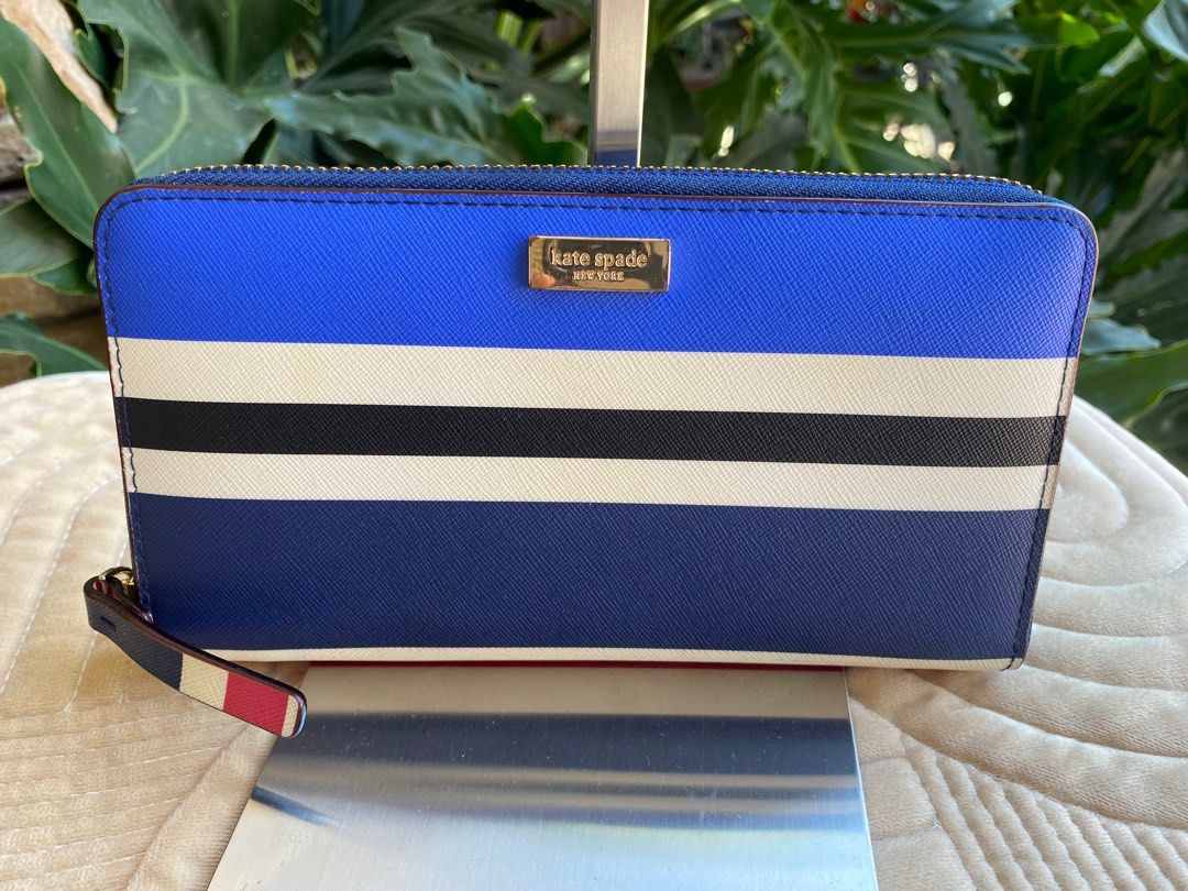 KATE SPADE Long Wallet (Category: Luxury Bags & Wallets) located in Baliuag. Submitted by nylinel (Listing ID 1301481405, Image 1). Description: KATE SPADE Wallet Size: L- 7.5” x H- 4” Preloved in good condition .