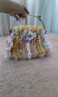 Lace bag with kisslock handbag