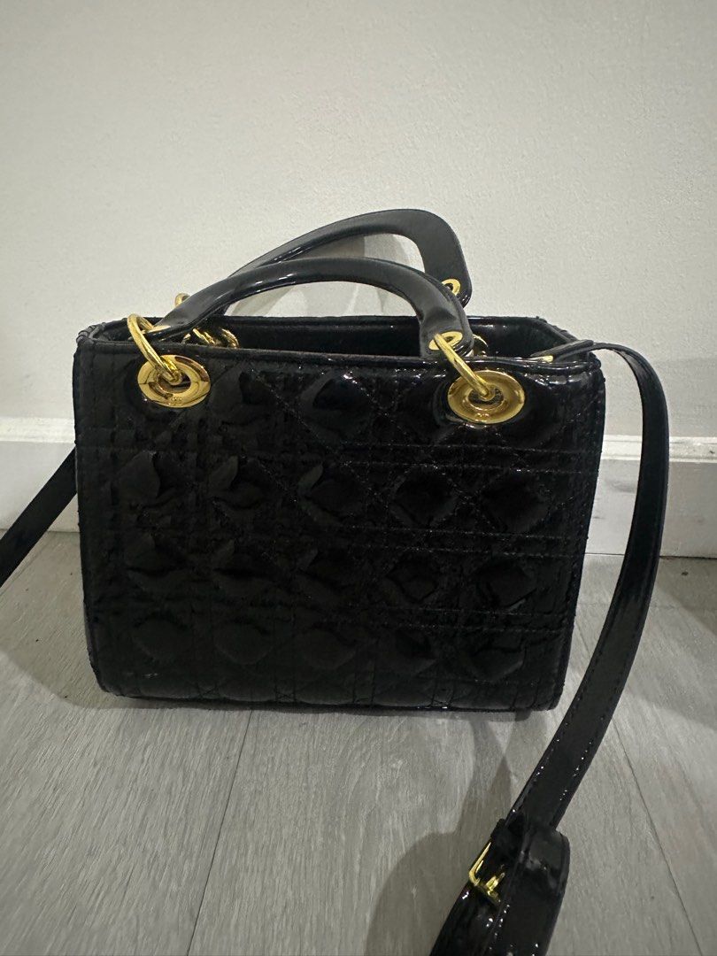 Lady Dior Black Patent Leather (Category: Purses & Pouches) located in Makati City. Submitted by luxedeclutter (Listing ID 1301653130, Image 2). Description: Lady Dior Patent Leather With Dust Bag .