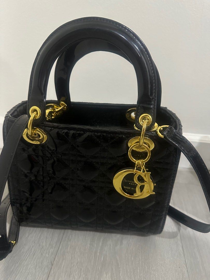 Lady Dior Black Patent Leather (Category: Purses & Pouches) located in Makati City. Submitted by luxedeclutter (Listing ID 1301653130, Image 1). Description: Lady Dior Patent Leather With Dust Bag .