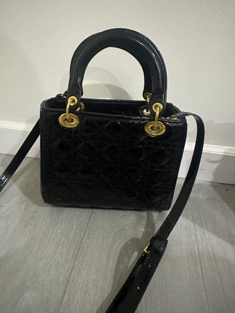 Lady Dior Black Patent Leather (Category: Purses & Pouches) located in Makati City. Submitted by luxedeclutter (Listing ID 1301653130, Image 3). Description: Lady Dior Patent Leather With Dust Bag .