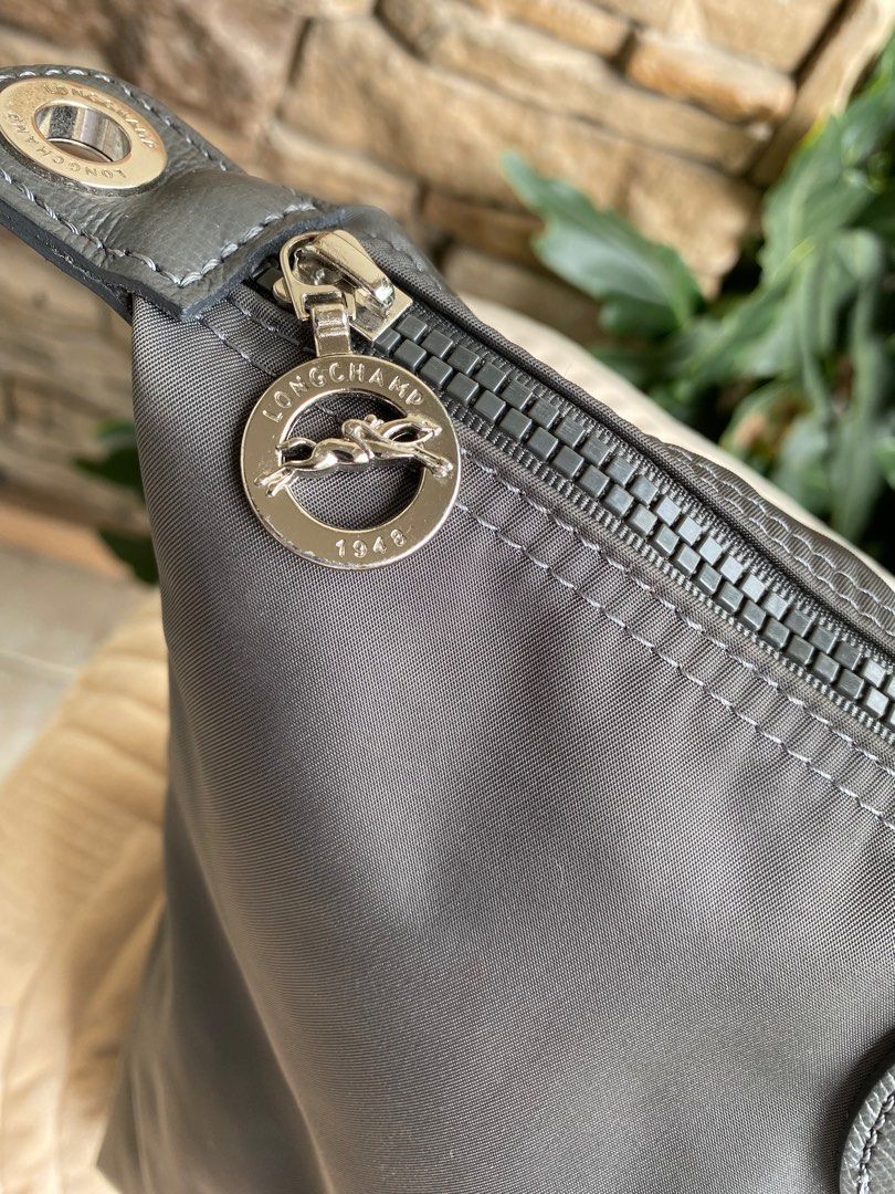 LONGCHAMP 2-Way Bag (Category: Luxury Bags & Wallets) located in Baliuag. Submitted by nylinel (Listing ID 1301481647, Image 3). Description: LONGCHAMP Paris Made in Romania Size: L- 17” (zipper part) x H- 10” x W - 6.5” Preloved in good condition with original dust bag.