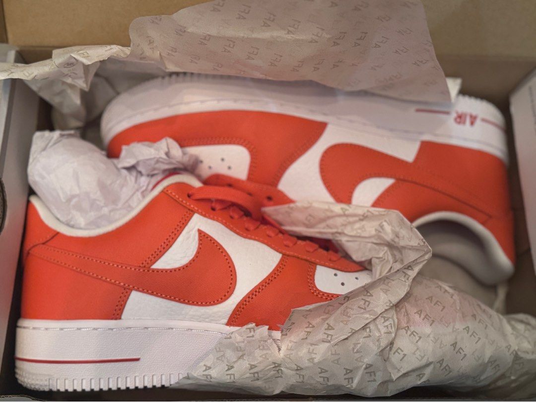 Orange white nike shoes discount