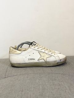 Original golden goose white and gold distressed sneakers