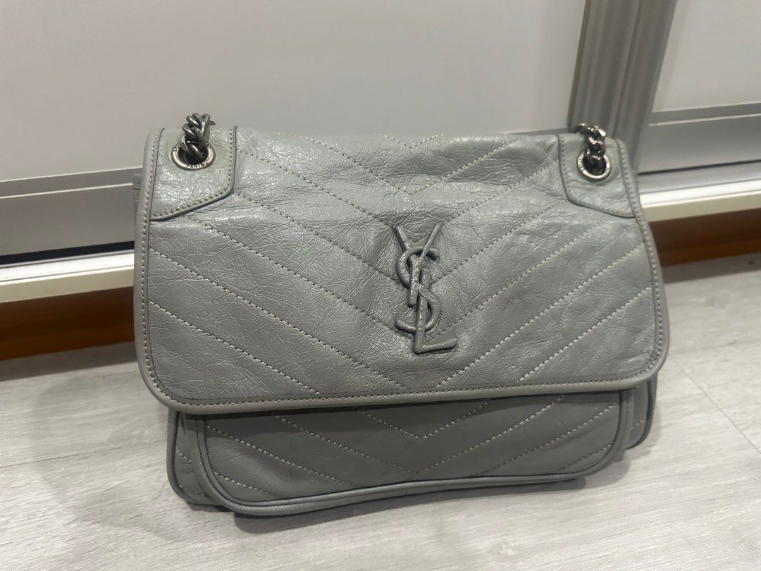 Ysl Saint Laurent Niki Bag (Category: Luxury Bags & Wallets) located in Makati City. Submitted by luxedeclutter (Listing ID 1301653306, Image 1). Description: The Niki Medium shoulder bag from Saint Laurent resurrects motifs from the label’s iconography to create a covetable investment piece, this style comes in vintage crinkled calfskin leather for an aged effect, with chevron stitching that’s become symbolic for the brand. Our favorite detail, 