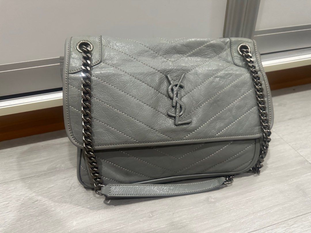 Ysl Saint Laurent Niki Bag (Category: Luxury Bags & Wallets) located in Makati City. Submitted by luxedeclutter (Listing ID 1301653306, Image 2). Description: The Niki Medium shoulder bag from Saint Laurent resurrects motifs from the label’s iconography to create a covetable investment piece, this style comes in vintage crinkled calfskin leather for an aged effect, with chevron stitching that’s become symbolic for the brand. Our favorite detail, 