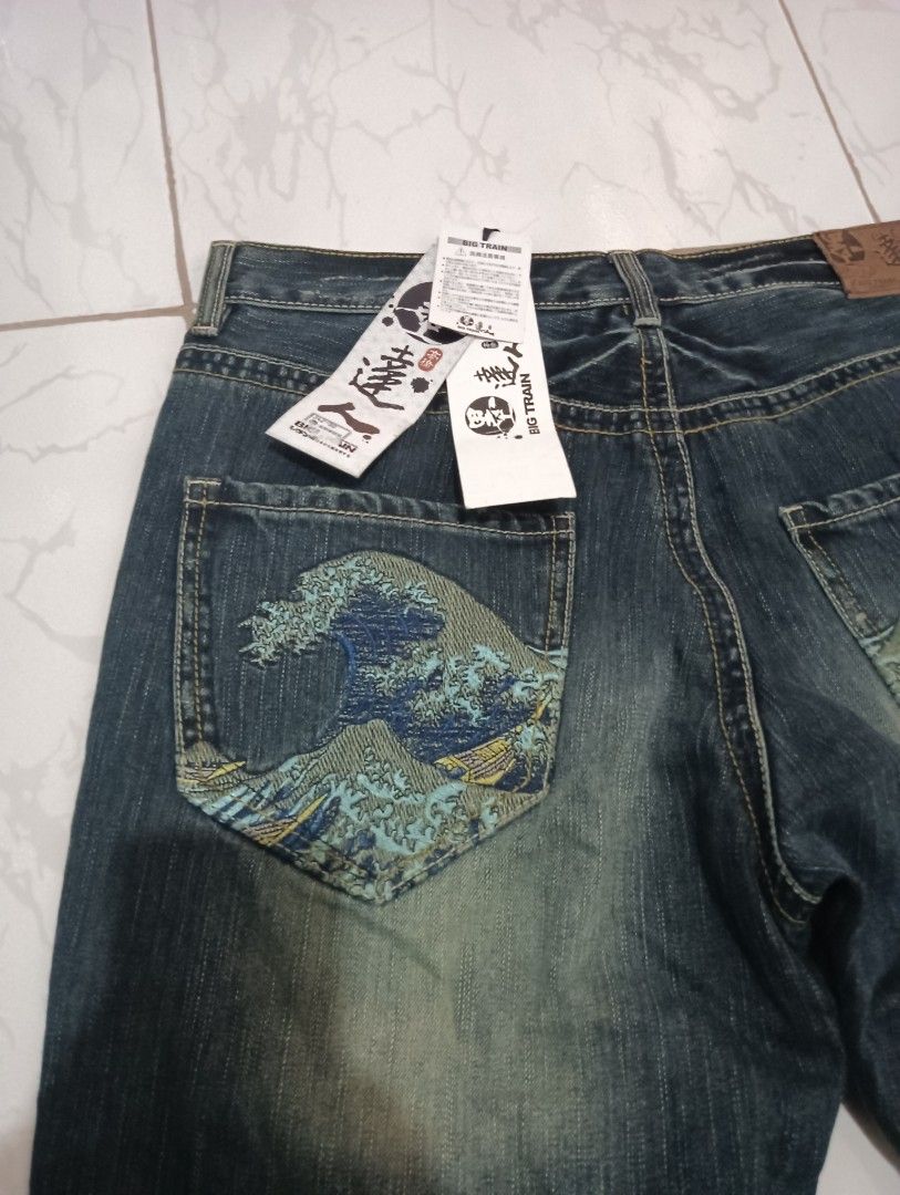 Brand New Big train embroidery wave design (Category: Jeans) located in Cebu City. Submitted by doblas123 (Listing ID 1301678650, Image 2). Description: 36 waistline 44 length 9.5 inches hem tattered design.
