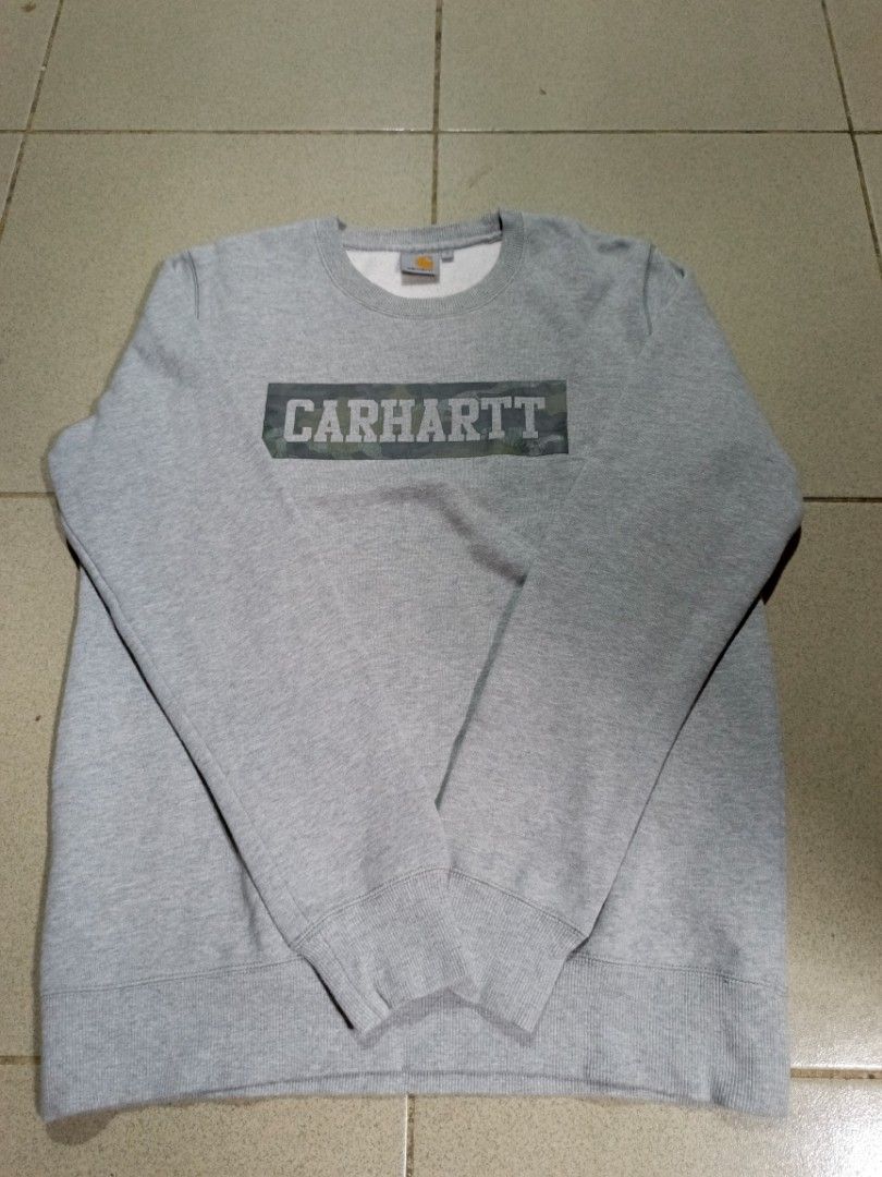 Carhartt Crewneck Sweater (Category: Activewear) located in Makati City. Submitted by young_wise.23 (Listing ID 1301703815, Image 1). Description: length 28 width 21 sleeve 26.